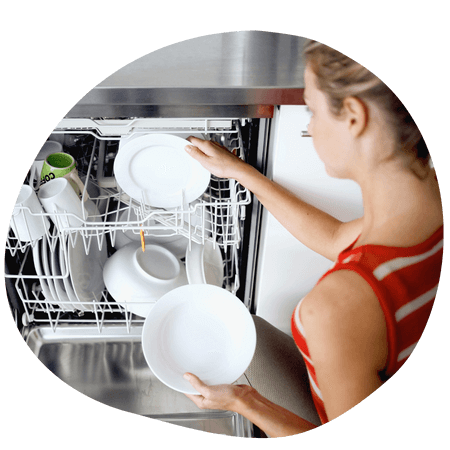 woman unloading a dishwasher