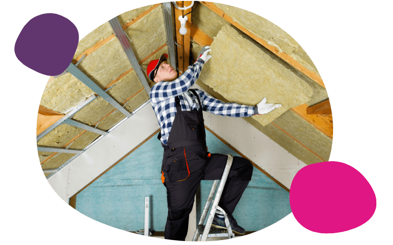 man installing loft insulation