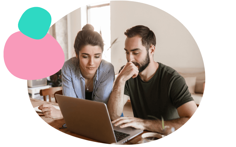 young couple checking their laptop