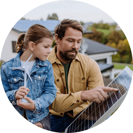 father and daughter learning about renewable energy