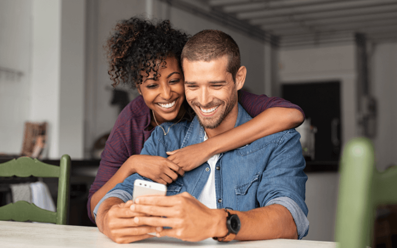 young couple checking their octoplus account
