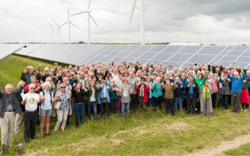 The Midcounties Co-operative Youth Empowered Committee at a solar panel field 
