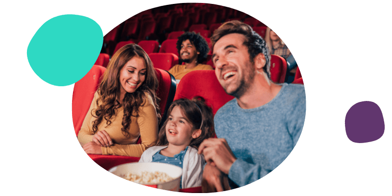 family enjoying time together at the cinema