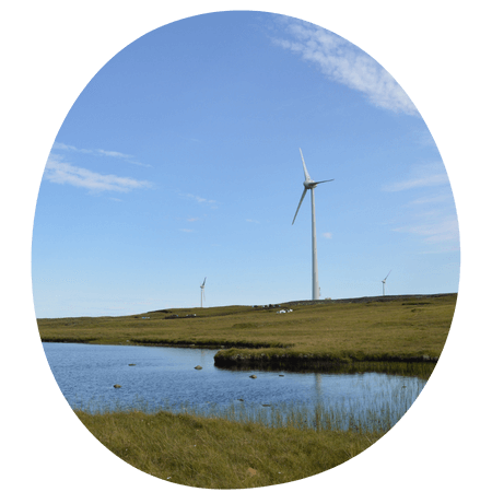 Wind turbine by a river