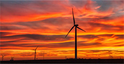 wind turbines in a sunset